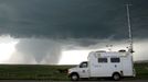 VORTEX2 field command vehicle with tornado in sight. Wyoming, LaGrange. June5, 2009. Photographer: Dr. Mike Coniglio, NOAA NSSL. Credit: VORTEX II .