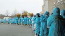 Workers wait for transportation to Tokyo Electric Power Co. (TEPCO)'s tsunami-crippled Fukushima Daiichi nuclear power plant at J-Village near the plant in Fukushima prefecture, in this photo released by Kyodo March 1, 2013, ahead of the second-year anniversary of the March 11, 2011 earthquake and tsunami. Mandatory Credit REUTERS/Kyodo (JAPAN - Tags: DISASTER ANNIVERSARY BUSINESS) ATTENTION EDITORS - THIS IMAGE HAS BEEN SUPPLIED BY A THIRD PARTY. IT IS DISTRIBUTED, EXACTLY AS RECEIVED BY REUTERS, AS A SERVICE TO CLIENTS. FOR EDITORIAL USE ONLY. NOT FOR SALE FOR MARKETING OR ADVERTISING CAMPAIGNS. MANDATORY CREDIT. JAPAN OUT. NO COMMERCIAL OR EDITORIAL SALES IN JAPAN. YES Published: Bře. 1, 2013, 2:29 odp.