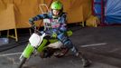 Edwin Anthony, 13, of the Thunderdrome troupe, prepares for a performance on his motorcycle in the back lot during a Cole Brothers Circus of the Stars stop over in Myrtle Beach, South Carolina, March 31, 2013. Traveling circuses such as the Cole Brothers Circus of the Stars, complete with its traveling big top tent, set up their tent city in smaller markets all along the East Coast of the United States as they aim to bring the circus to rural areas. The Cole Brothers Circus, now in its 129th edition, travels to 100 cities in 20-25 states and stages 250 shows a year. Picture taken March 31, 2013. REUTERS/Randall Hill (UNITED STATES - Tags: SOCIETY ENTERTAINMENT) Published: Dub. 1, 2013, 7:01 odp.