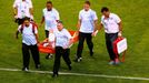 Chile's Charles Aranguiz is carried off the pitch during the 2014 World Cup Group B soccer match between Spain and Chile at the Maracana stadium in Rio de Janeiro June 18