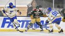 Brandon Duhaime (21) battles for the puck with St. Louis Blues center Ryan O'Reilly (90) and defenseman Marco Scandella (6)