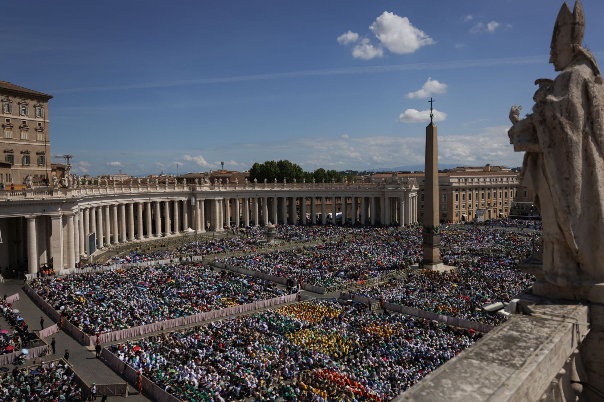 Faithful attend Mass in St. Peter's Square