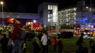 People leave the London Luton airport as emergency services respond to a fire in the Terminal Car Park 2, in Luton, Britain, October 11, 2023.  REUTERS/Peter Cziborra