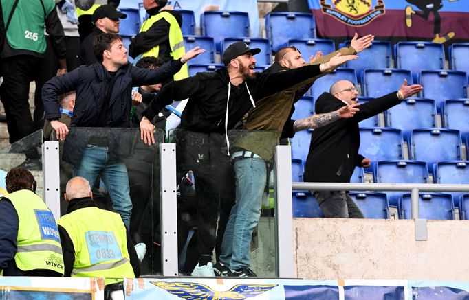 Soccer Football - Serie A - Lazio v AS Roma - Stadio Olimpico, Rome, Italy - March 19, 2023 Lazio fans react towards AS Roma fans inside the stadium before the match REUT