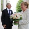 Angela Merkelová při setkání s Vladimirem Putinem v Soči