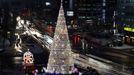 A Christmas tree is lit up to celebrate the upcoming Christmas holiday in front of City Hall in Seoul, South Korea, Wednesday, Dec. 5, 2012. (AP Photo/Lee Jin-man)