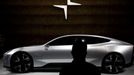 FILE PHOTO: A man looks at a Polestar Precept car at the Beijing International Automotive Exhibition, or Auto China show, in Beijing, China September 26, 2020. REUTERS/Th