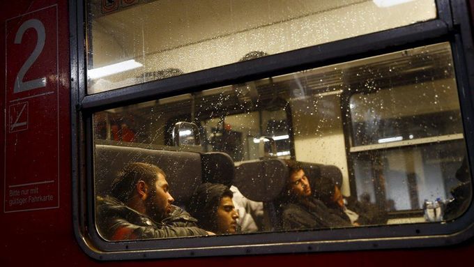 Uprchlíci ve vlaku v Německu.