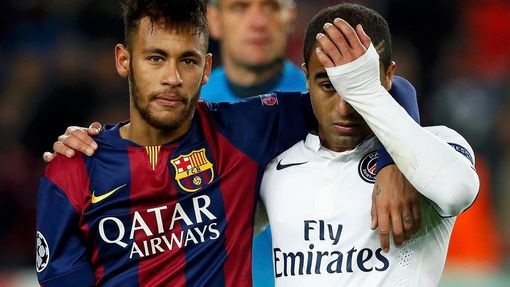 Paris St Germain's Lucas walks off the pitch with Barcelona's Neymar after their Champions League Group F soccer match at the Nou Camp stadium in Barcelona