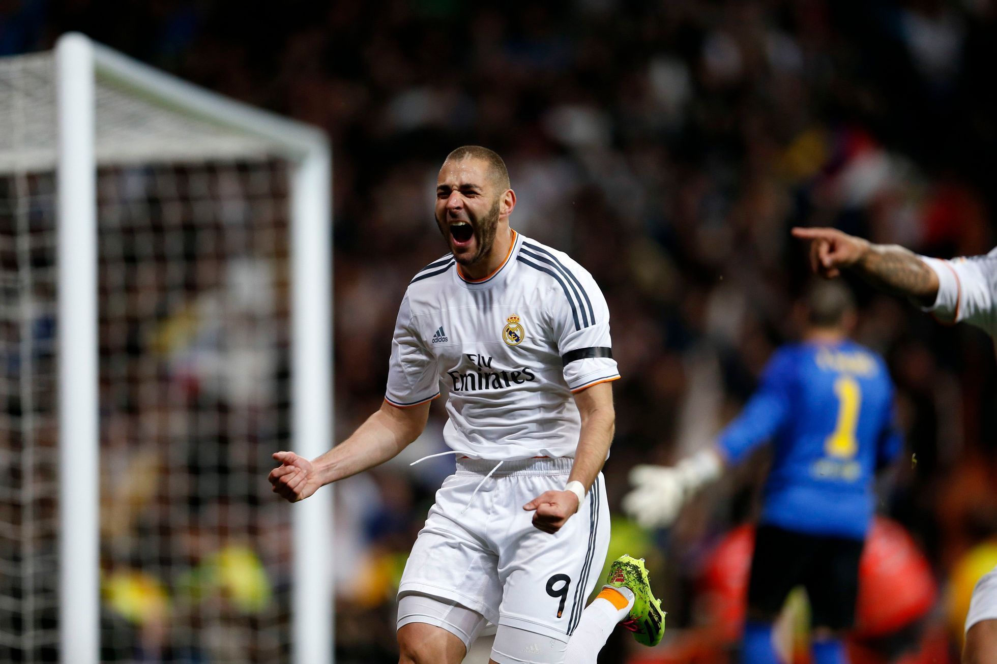Real Madrid's Karim Benzema celebrates a goal against Barcelona during La Liga's second 'Clasico' soccer match of the season in Madrid