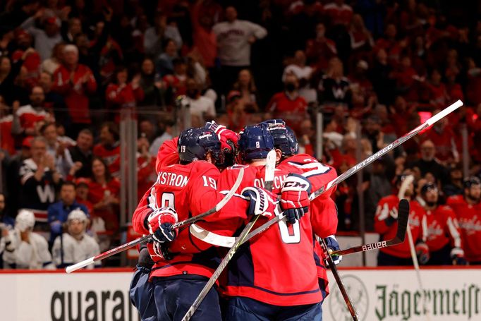 Apr 6, 2022; Washington, District of Columbia, USA; Washington Capitals defenseman John Carlson (74) celebrates with teammates after scoring a goal against the Tampa Bay