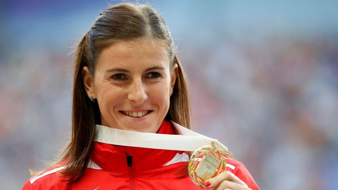Zuzana Hejnová se zlatou medailí.