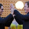 Actor John Travolta and director Quentin Tarantino pose on the red carpet they arrive for the screening of the film &quot;Sils Maria&quot; in competition at the 67th Cannes Film Festival in Cannes