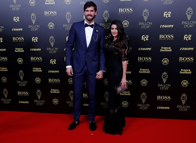 Soccer Football - The Ballon d’Or awards - Theatre du Chatelet, Paris, France - December 2, 2019   Liverpool's Alisson Becker and Natalia Loewe arrive  REUTERS/Christian