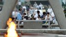 People pray for the victims of the 1945 atomic bombing, in the Peace Memorial Park in Hiroshima August 6, 2013, on the 68th anniversary of the world's first atomic bombing on the city. Mandatory Credit. REUTERS/Kyodo (JAPAN - Tags: ANNIVERSARY CONFLICT) ATTENTION EDITORS - THIS IMAGE WAS PROVIDED BY A THIRD PARTY. FOR EDITORIAL USE ONLY. NOT FOR SALE FOR MARKETING OR ADVERTISING CAMPAIGNS. THIS PICTURE IS DISTRIBUTED EXACTLY AS RECEIVED BY REUTERS, AS A SERVICE TO CLIENTS. MANDATORY CREDIT. JAPAN OUT. NO COMMERCIAL OR EDITORIAL SALES IN JAPAN. YES Published: Srp. 5, 2013, 11:44 odp.