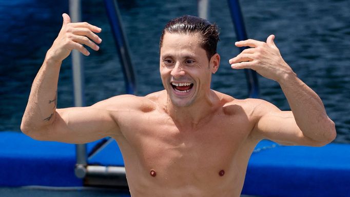 Fukuoka 2023 World Aquatics Championships - High Diving - Seaside Momochi Beach Park, Fukuoka, Japan - July 27, 2023 Romania's Constantin Popovici celebrates after winnin