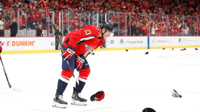Nov 3, 2019; Washington, DC, USA; Washington Capitals left wing Jakub Vrána (13) skates to the bench after scoring a hat trick goal against the Calgary Flames in the seco