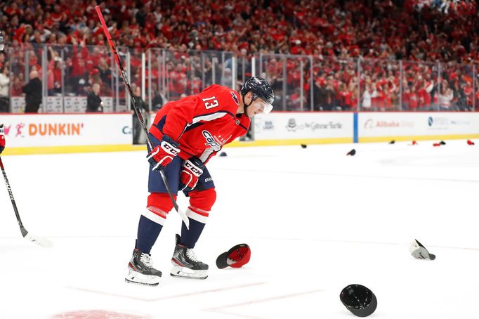 Nov 3, 2019; Washington, DC, USA; Washington Capitals left wing Jakub Vrána (13) skates to the bench after scoring a hat trick goal against the Calgary Flames in the seco