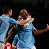 Manchester City's Kompany celebrates with teammates after scoring a goal against Liverpool during their English Premier League soccer match in Manchester
