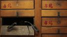 Two snakes are seen inside their compartment in wooden cupboards labelled "Poisonous Snakes", at a snake soup store in Hong Kong January 29, 2013. There are scores of people in Hong Kong who have through generations tamed snakes to make soup out of them, a traditional cuisine believed to be good for the health. Yet the people behind providing fresh snakes for the savoury meal thought to speed up the body's blood flow and keep it strong in the cold winter months may be doomed, with young people increasingly reluctant to take on a job they see as hard and dirty. Picture taken January 29, 2013. REUTERS/Bobby Yip (CHINA - Tags: ANIMALS SOCIETY FOOD TPX IMAGES OF THE DAY) Published: Úno. 7, 2013, 2:02 odp.