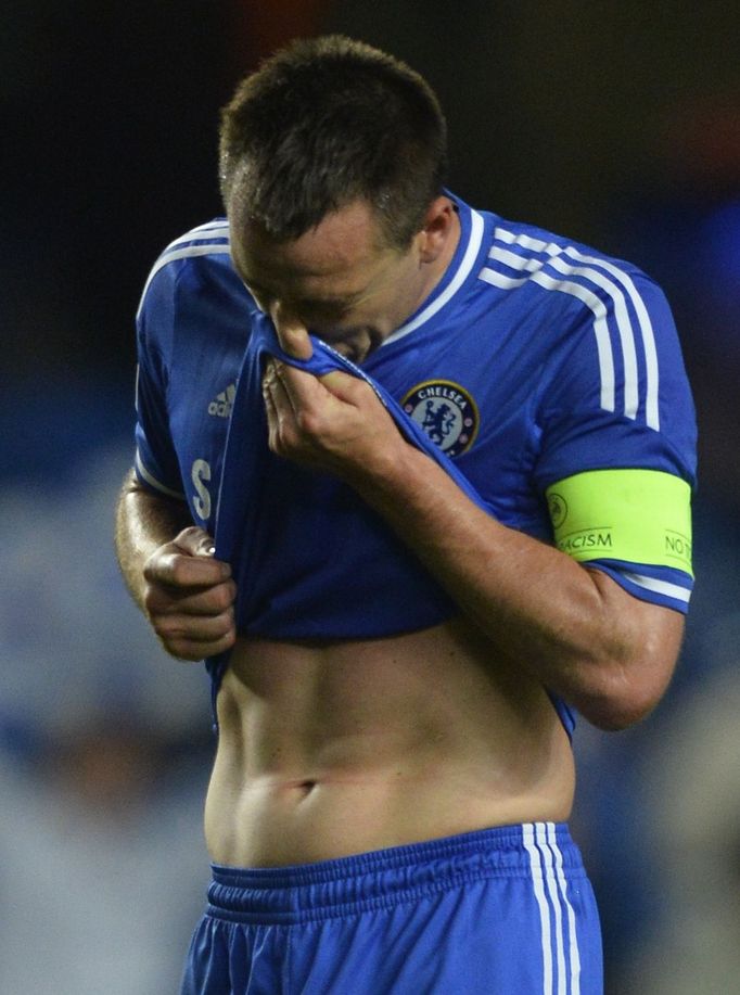 Chelsea's John Terry leaves the pitch after the final whistle in the Champion's League semi-final second leg soccer match against Atletico Madrid at Stamford Bridge in Lo