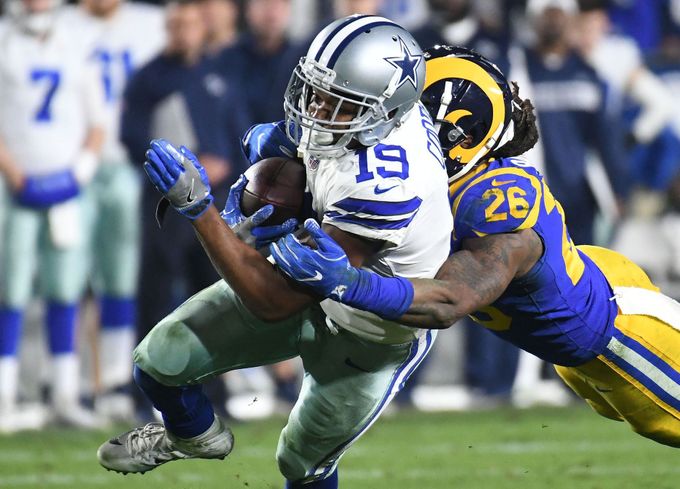 Jan 12, 2019; Los Angeles, CA, USA; Los Angeles Rams inside linebacker Mark Barron (26) tackles Dallas Cowboys wide receiver Amari Cooper (19) in the fourth quarter in a