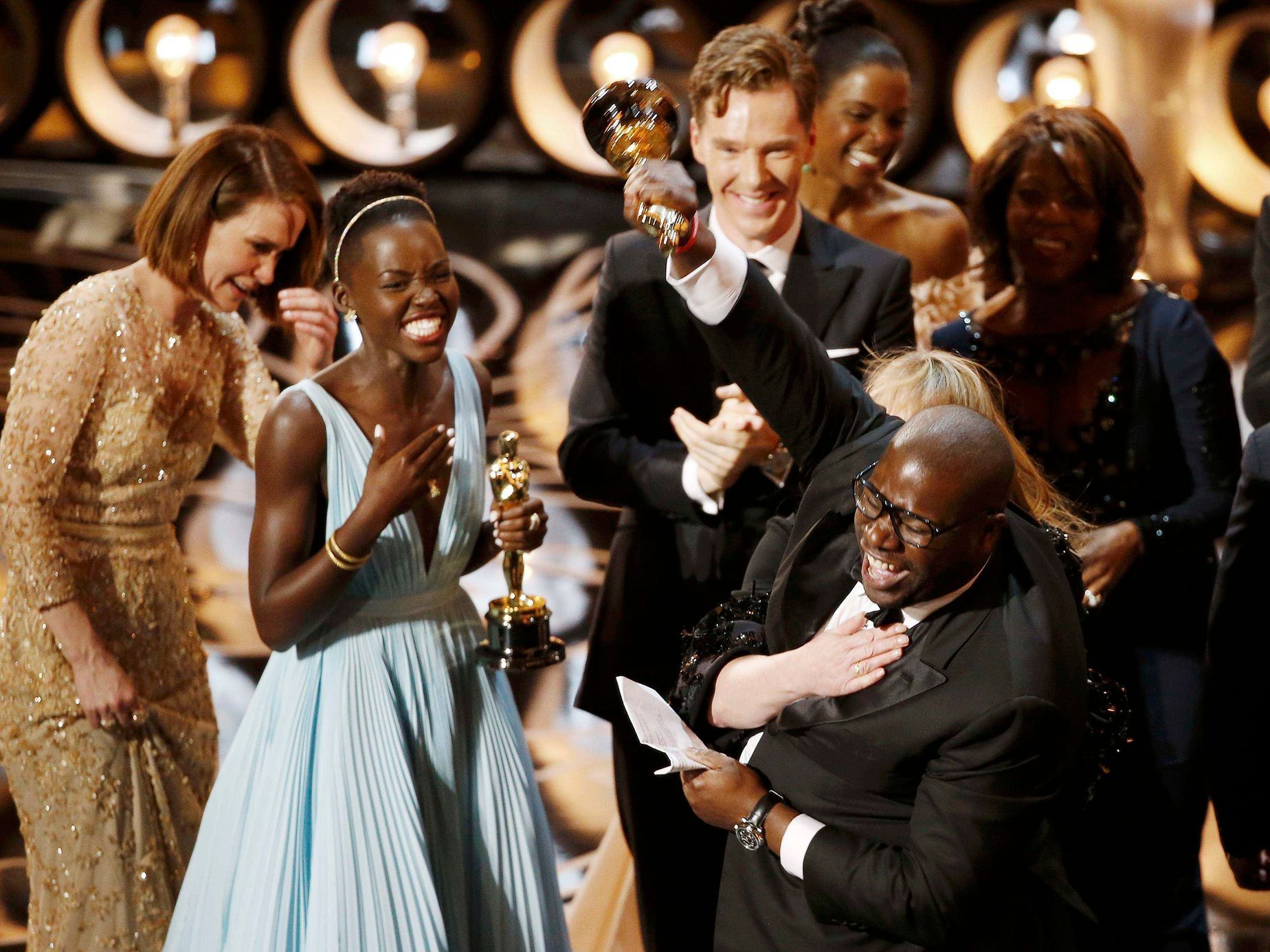 Director and producer McQueen celebrates after accepting the Oscar for best picture for his film &quot;12 Years a Slave&quot; at the 86th Academy Awards in Hollywood