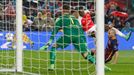 Arsenal's Danny Welbeck shoots on Marc-André ter Stegen