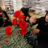 Palestinské ženy připravují karafiáty pro export z Rafahu