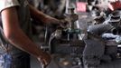 Middle East News - June 4, 2013 June 4, 2013 - Gaza City, Gaza Strip, Palestinian Territory - A young Palestinian repairs a car in Gaza city, June 04, 2013. Child labor is widespread in the Gaza Strip because of the high rates of poverty and unemployment, according to reports