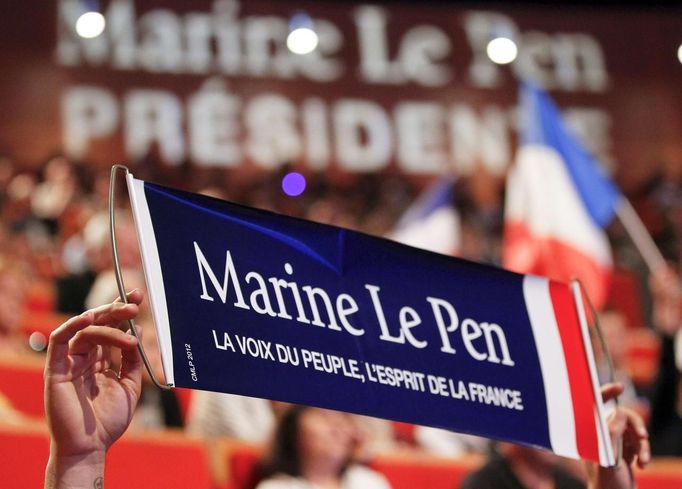 A banner which reads &quot;Marine Le Pen, People's voice, France's spirit&quot; is seen during a meeting of Marine Le Pen in Lyon