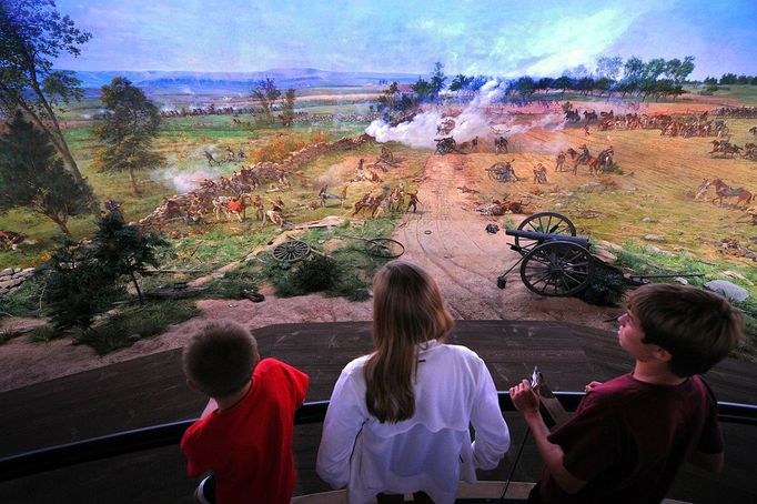 Image: 0077869211, License: Rights managed, Tourists view the newly restored cyclorama painting; an immersive 360° cylindrical painting which places the viewer in the middle of "Picket's Charge" on August 13, 2010 at the Gettysburg National Military Park Museum and Visitor Center in Gettysburg Pennsylvania. The Battle of Gettysburg was a turning point in the US Civil War, the Union victory in the summer of 1863 that ended General Robert E. Lee's second and most ambitious invasion of the North. Often referred to as the "High Water Mark of the Rebellion", it was the war's bloodiest battle with 51,000 casualties. It also provided President Abraham Lincoln with the setting for his most famous address., Place: UNITED STATES, Model Release: No or not aplicable, Credit line: Profimedia.cz, AFP