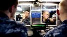 April 25, 2011 - Fort Lauderdale, Florida, U.S. - -- Fort Lauderdale, Fla. -- Machinist's Mate Third Class Jordon Free, left, of Anderson, South Carolina, and Petty Officer Second Class E-5 Peter Plowmon, of Boyd, Montana, shave in the berthing area, or living quarters, aboard the USS Annapolis (SSN 760), a S6G nuclear reactor powered fast attack submarine, sailing to Port Everglades in Fort Lauderdale on Monday. The USS Annapolis measures 362 ft. in length and 33 ft. at the beam, a diving depth of over 400 ft., 27+ mph, 12 vertical launch missile tubes, 4 torpedo tubes, and a crew of 130 enlisted submariners. The submarine was commissioned April 11, 1992 with its homeport in Groton, Connecticut. USS Annapolis sailed to the 21st Anniversary of Fleet Week at Port Everglades, Fort Lauderdale. (Credit Image: © Gary Coronado/The Palm Beach Post) ( a