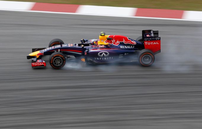 Red Bull Formula One driver Daniel Ricciardo of Australia drives during the first practice session of the Malaysian F1 Grand Prix at Sepang International Circuit outside