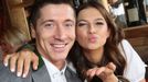 FC Bayern Munich's Lewandowski and his wife Anna pose during their visit at the Oktoberfest in Munich