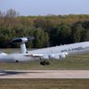 A NATO Airborne Warning and Control Systems aircraft takes-off for flight to Romania from the AWACS air base in Geilenkirchen, near the German-Dutch border