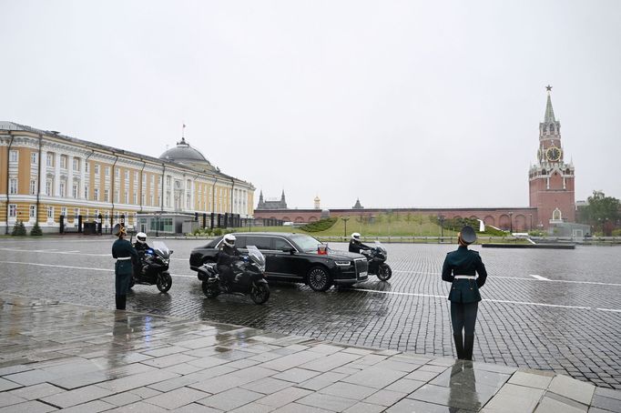 The Aurus Senate limousine carrying Russian President Vladimir Putin and Aurus Merlon bikes drive prior to an inauguration ceremony at the Kremlin in Moscow, Russia May 7