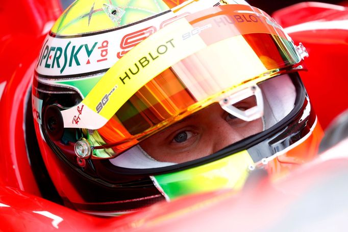 FILE PHOTO: Formula One F1 - German Grand Prix - Hockenheimring, Hockenheim, Germany - July 27, 2019   Ferrari's Mick Schumacher in the pits   REUTERS/Kai Pfaffenbach/Fil