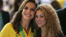 Singer Shakira (R) from Colombia poses with Brazil singer Ivete Sangalo during the Confederations Cup final soccer match between Brazil and Spain at the Estadio Maracana