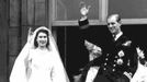 Princess Elizabeth, left, and her husband Prince Philip, wave from the balcony of London's Buckingham Palace, following their wedding, November 20, 1947