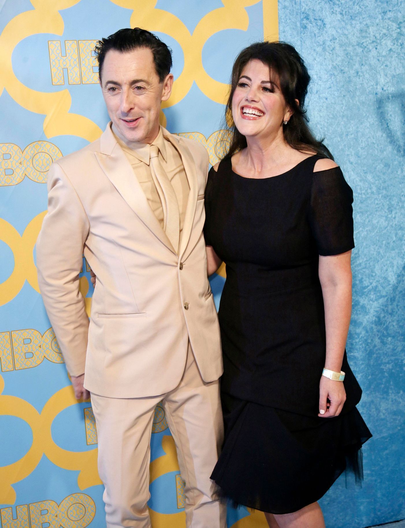 Actor Alan Cummings and Monica Lewinsky pose at the HBO after-party after the 72nd annual Golden Globe Awards in Beverly Hills