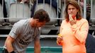 Britain's Murray listen and his coach and former tennis player Mauresmo arrive for a training session for the French Open tennis tournament at the Roland Garros stadium i