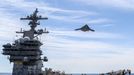 ¨US Navy Launches Drone May 14, 2013 - Virginia Coast, Virginia , U.S. - The unmanned X-47B flies over the aircraft carrier George H.W. Bush. George H.W. Bush is the first aircraft carrier to successfully catapult launch an unmanned aircraft from its flight deck.