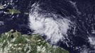 NOAA handout satellite image shows Tropical Storm Isaac over the Lesser Antilles on August 22, 2012. National Oceanic and Atmospheric Administration/Handout (UNITED STATES - Tags: ENVIRONMENT) FOR EDITORIAL USE ONLY. NOT FOR SALE FOR MARKETING OR ADVERTISING CAMPAIGNS. THIS IMAGE HAS BEEN SUPPLIED BY A THIRD PARTY. IT IS DISTRIBUTED, EXACTLY AS RECEIVED BY REUTERS, AS A SERVICE TO CLIENTS Published: Srp. 22, 2012, 11:04 odp.