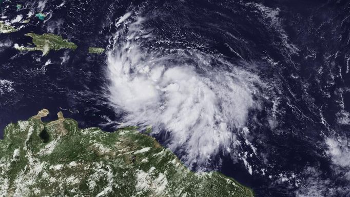 NOAA handout satellite image shows Tropical Storm Isaac over the Lesser Antilles on August 22, 2012. National Oceanic and Atmospheric Administration/Handout (UNITED STATES - Tags: ENVIRONMENT) FOR EDITORIAL USE ONLY. NOT FOR SALE FOR MARKETING OR ADVERTISING CAMPAIGNS. THIS IMAGE HAS BEEN SUPPLIED BY A THIRD PARTY. IT IS DISTRIBUTED, EXACTLY AS RECEIVED BY REUTERS, AS A SERVICE TO CLIENTS Published: Srp. 22, 2012, 11:04 odp.