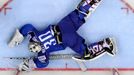 Italy's goaltender Daniel Belissimo (top) defends during the men's ice hockey World Championship Group A game against Norway at Chizhovka Arena in Minsk May 10, 2014. Reu