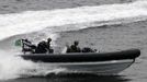 A Brazilian Navy boat takes part in an exercise to prepare their operational readiness to combat terrorist attacks and riots ahead of the FIFA Confederations Cup and World Youth Day, on the Amazonas ship in Rio de Janeiro May 29, 2013. REUTERS/Sergio Moraes (BRAZIL - Tags: SPORT SOCCER MILITARY MARITIME) Published: Kvě. 29, 2013, 4:51 odp.