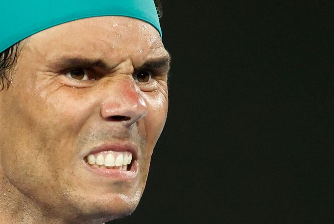 Tennis - Australian Open - Men's Singles Final - Melbourne Park, Melbourne, Australia - January 31, 2022 Spain's Rafael Nadal reacts during the final against Russia's Dan