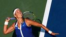 Victoria Azarenka of Belarus serves to Misaki Doi of Japan during their match at the 2014 U.S. Open tennis tournament in New York