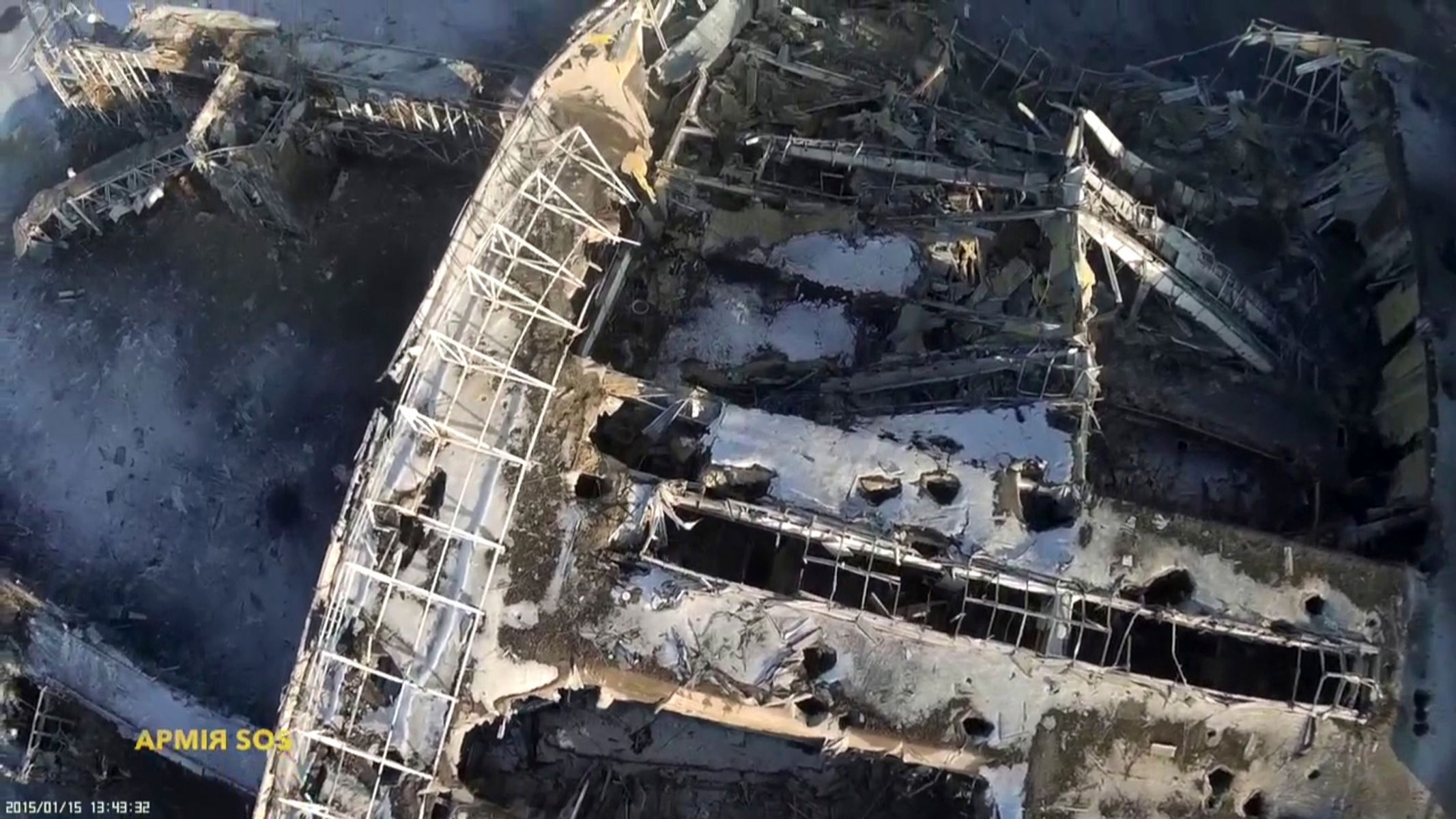 Still image taken from handout aerial footage shot by a drone, shows the terminal building of the Sergey Prokofiev International Airport damaged by shelling during fighting between pro-Russian separat